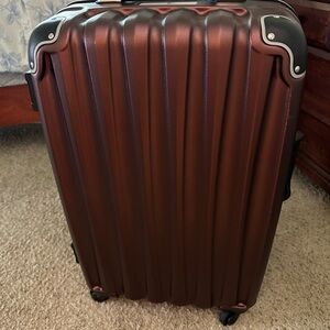 Brown Hardshell Rolling Suitcase